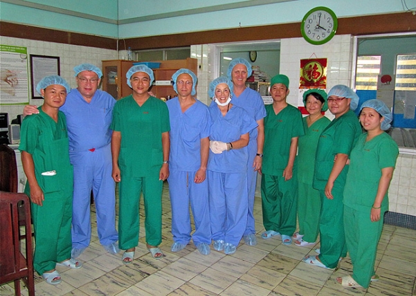 Craig Blum, M.D. (second from left), Mark Anders, M.D. (fourth from left), and Robert Smolinski, M.D. (fifth from right). <i>Photographs courtesy of Robert Smolinski, M.D.</i>