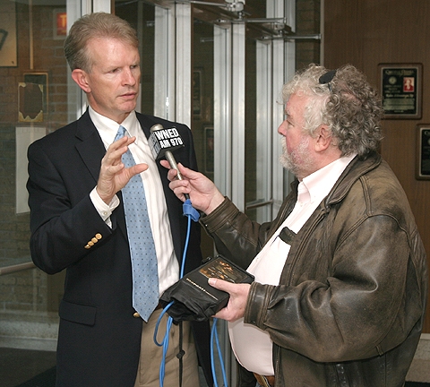 John Leddy, M.D. being interviewed at the conference by Mike Desmond from WNED AM 970 Radio